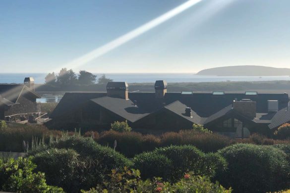 A beautiful ray of light caps a view of the hotel from the bocce ball court