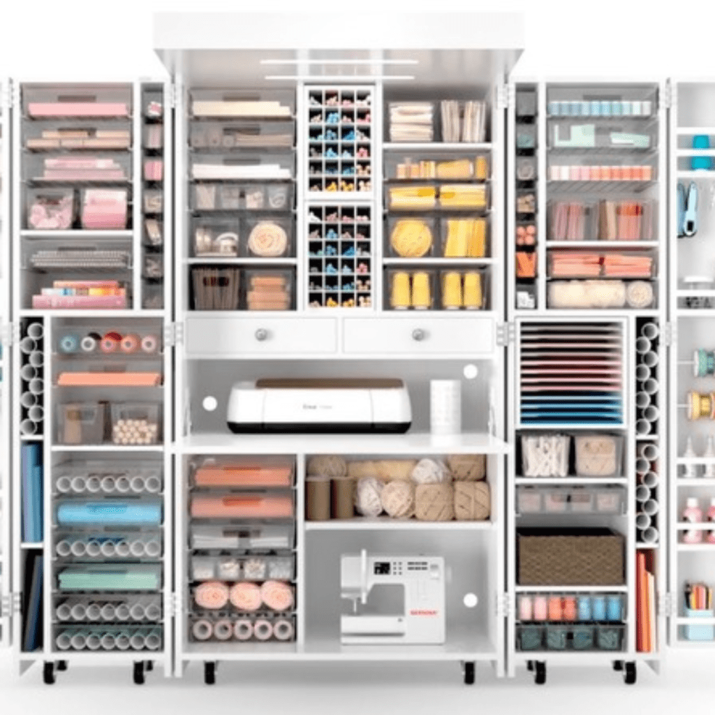 Dreambox - a collapsable piece of furniture on wheels with numerous cubbies and drawers for art supplies.