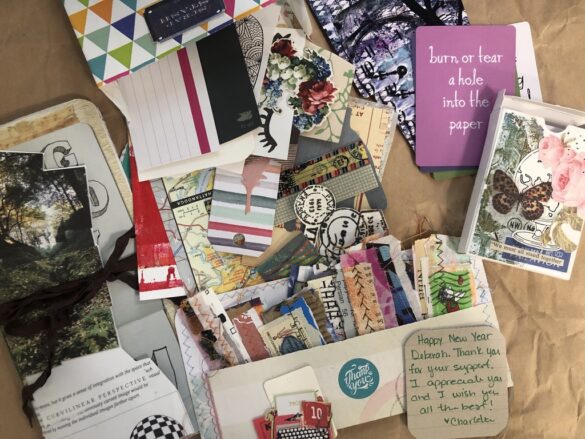 Various papers and ephemera laid out on a table.