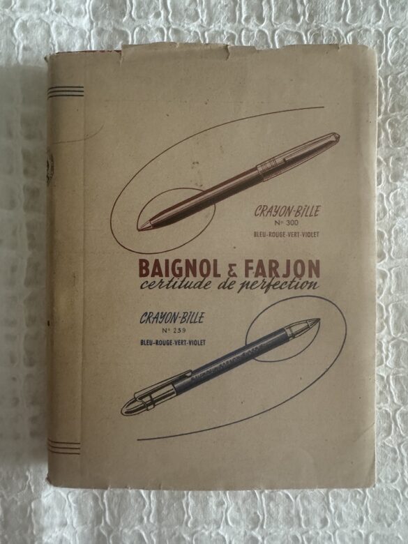 A picture of the novel titled "Who I Dare To Love", written in French and wrapped in an advertisement for ballpoint pencils. Book purchased used.