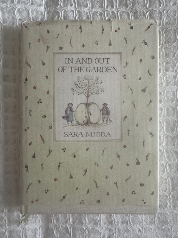 In and Out of the Garden, purchased used. This photo shows a well worn cover with whimsical art in yellows and greens and reds