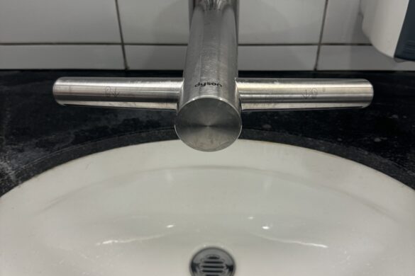 European train station bathroom faucet with integrated water and dryer—found in Zurich during the 33 Days in Europe trip.