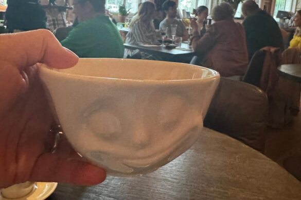 Cappuccino in a glass mug at The Anchor restaurant in Lucerne