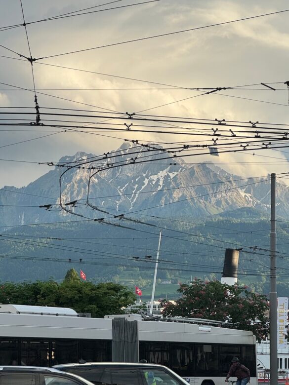 View of Mt. Pilatus from Lucerne bus lines with overhead cables, Switzerland