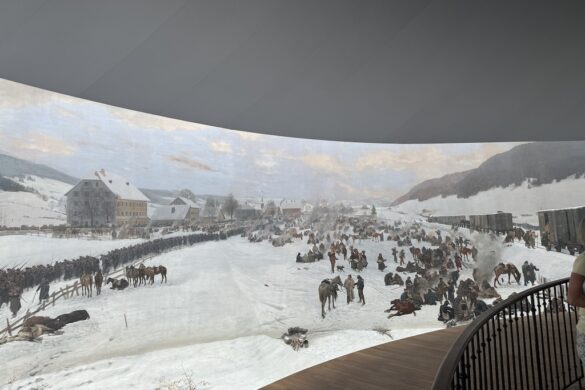 Crowd scene in the Bourbaki Panorama depicting groups of people and horses.