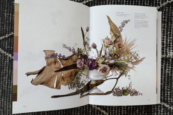 Book spread showing a floral arrangement in brown, purple, and mauve tones with lavender accent, Flower Color Theory, page 358.