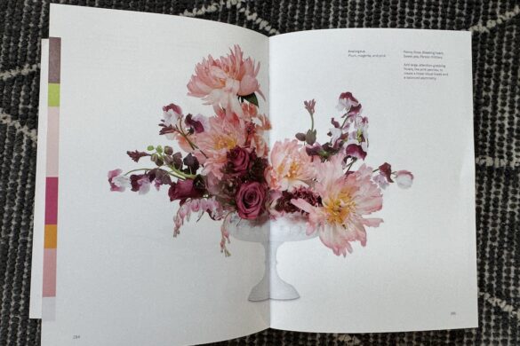 Book spread showing an analogous floral arrangement in pink, magenta, and purple hues, Flower Color Theory, page 284.