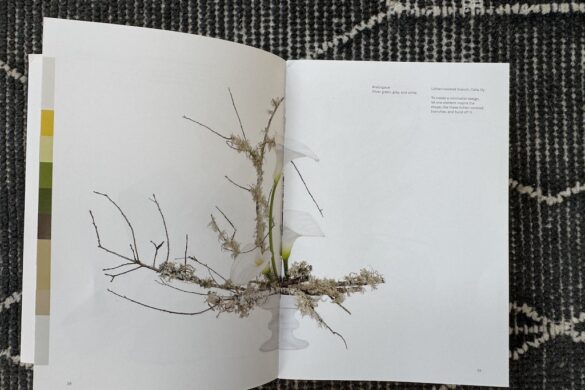 Book spread showing an analogous floral arrangement in silver green, gray, and white, Flower Color Theory, page 38.