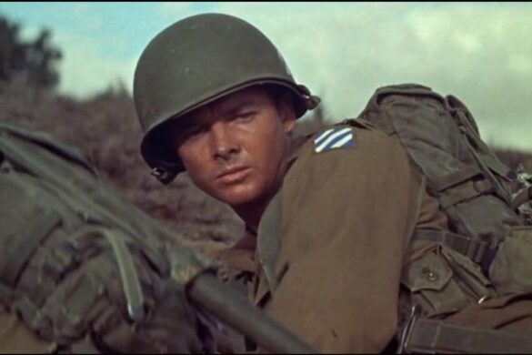 Audie Murphy lying in a foxhole during a combat scene from the 1955 film To Hell and Back.