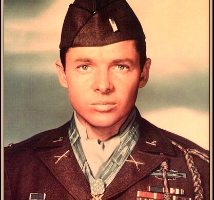 Portrait of Lieutenant Audie Murphy in uniform wearing the Medal of Honor and other military decorations.