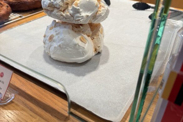 Coffee and dessert on a café table in Strasbourg