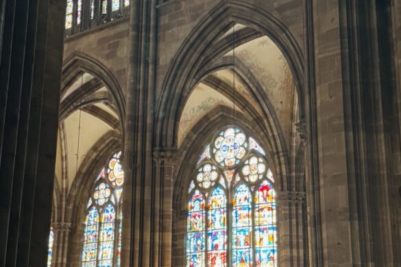 Interior view of Strasbourg Cathedral showing arches and stone columns