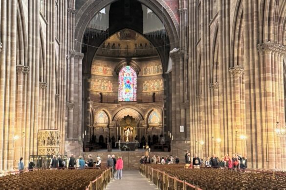 Long view down the cathedral nave with columns and vaulted ceiling