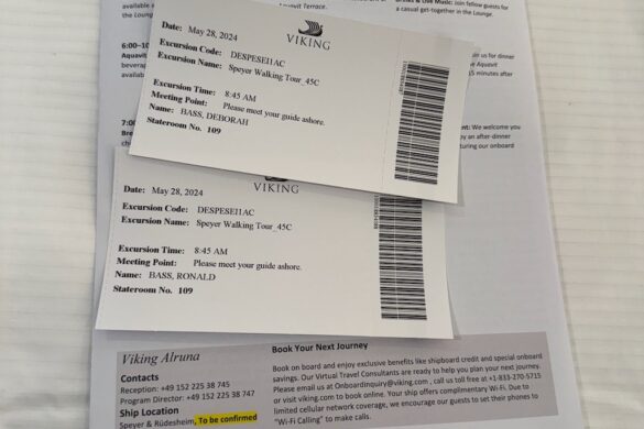 printed Viking River Cruises daily itinerary placed on cabin bed during evening turndown