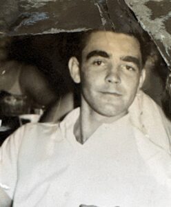 black and white square photo of Deborah Bass’s father as a young man during his Navy years