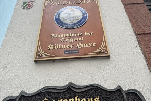 Historic plaque and sign for Haxenhaus zum Rheingarten dated 1479 in Cologne, Germany