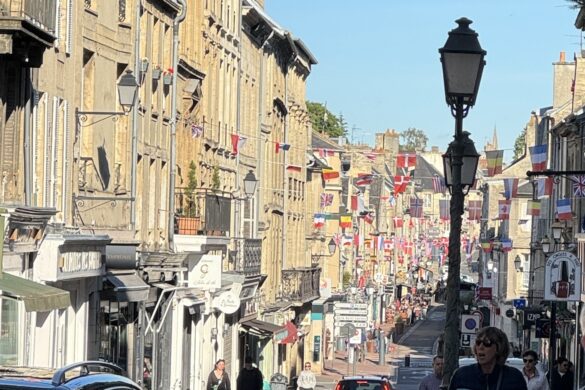 main street in Bayeux lined with Allied flags during the D-Day anniversary week
