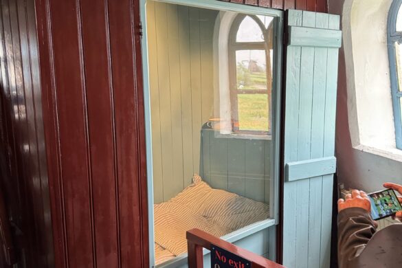 entryway inside historic Kinderdijk windmill showing small interior room and doorway