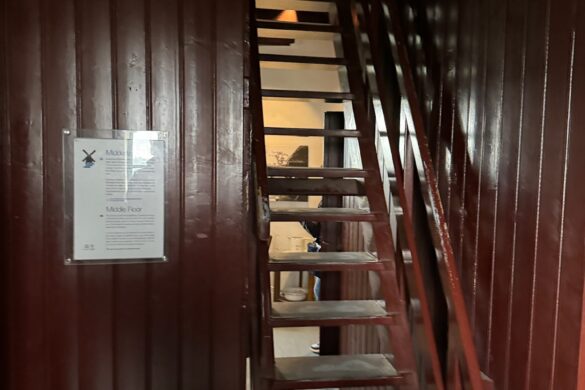 steep wooden staircase inside historic Kinderdijk windmill