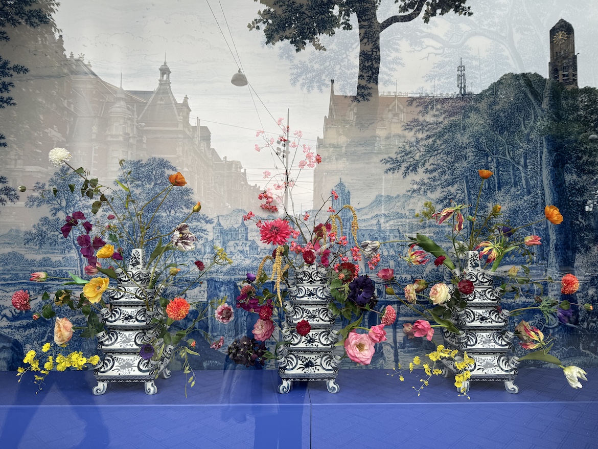 Floral storefront display in Amsterdam inspired by Dutch still-life painting