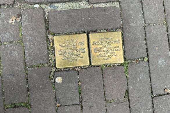 Two Stolpersteine memorial stones for Alexander Mok and Jansje Mok-Koren set into an Amsterdam sidewalk