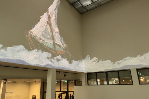 Projected details from a Vincent van Gogh painting sweeping across interior walls at the Van Gogh Museum