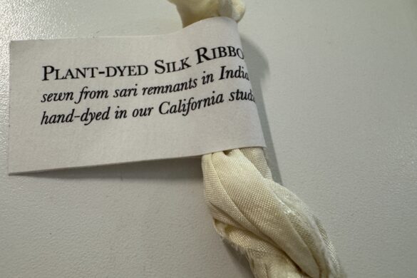 Plant-Dyed Silk Ribbon Close-up of plant-dyed silk ribbon label included in Farmette Card Subscription.