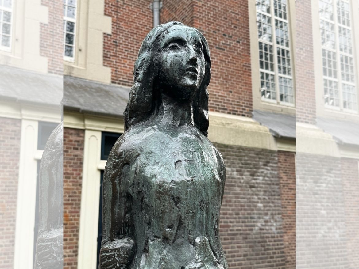 Anne Frank statue near the Anne Frank House in Amsterdam